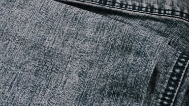 Karanlık yüksek kaliteli kot doku hareketli.