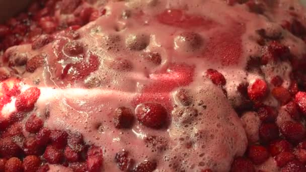 Closeup shot of cooking delicious strawberry jam. — Stock Video