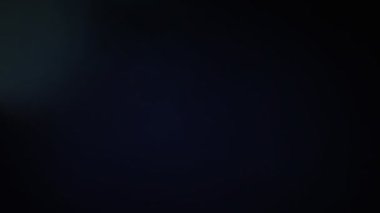 Mavi tonları soyut bokeh. Geçiş ve bindirme etkileri ışık sızıntıları.