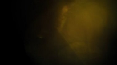 Sıcak, altın bokeh yavaşça karanlıkta Bakliyat.