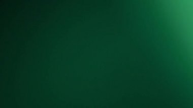 Yeşil zümrüt ışık parlaklık parçacıklar bokeh, tatil kavramı.