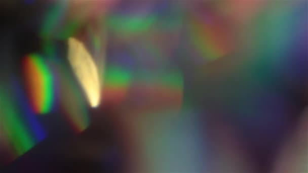 Bokeh futuriste. Feuille holographique irisée. Multicolore surface brillante et fond abstrait brillant .