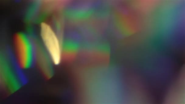 Futuristické bokeh. Holografické Iridescentní fólie. Vícebarevné lesklý povrch a zářící abstraktní pozadí. — Stock video