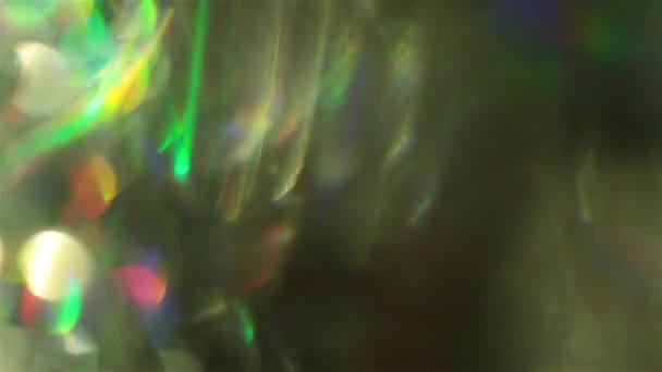 Bunte futuristische Bokeh, spektrale futuristische Farben, holographische irisierende Folie. — Stockvideo