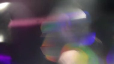 Vintage holografik yanardöner folyoyu bakıyor. Fütüristik yüzey ve parlayan bir arka plan.