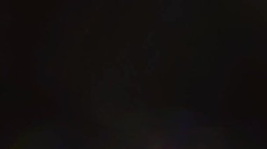 Renkli bokeh. Holografik yanardöner folyo. Çok renkli parlak yüzeyi ve arka plan parlayan.