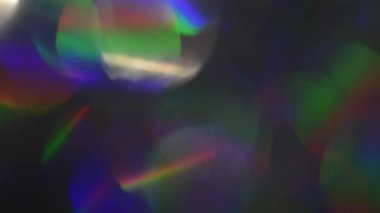 Renkli festival yanardöner bokeh, spektral fütüristik renkler, holografik folyo. Yardımcı grafik efekti için ışık sızıntıları.