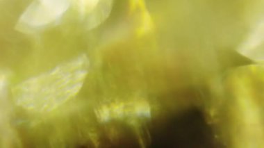 Yumuşak parçacıklar sıcak tonlar. Döngü arka plan.