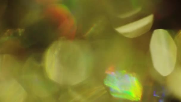 Bokeh doré déconcentré et brillance scintille de lumière vive . — Video