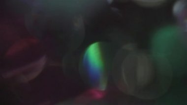 Festival çelenk yansımaları, rüya gibi bokeh, vintage holografik arka plan.