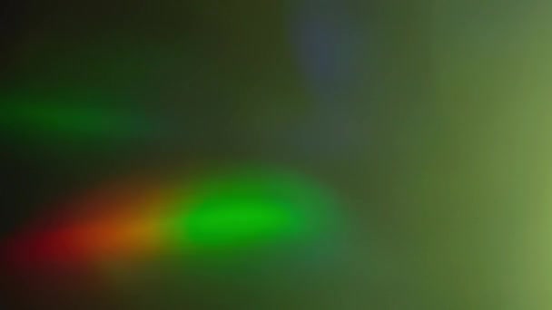ホログラムの虹色光の効果。自然の作成された抽象的な背景. — ストック動画
