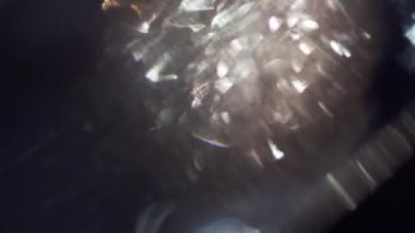 Soyut Işık sızıntıları, renkli cam mercek fişekleri. 4k Prores.
