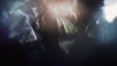 Canlı renkli bokeh, koyu arka plan üzerinde yaratıcı geçiş.