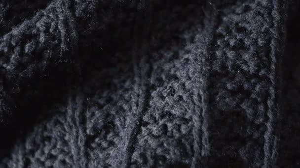 Creative blue background, knitted fabric, warm sweater. — Stock Video