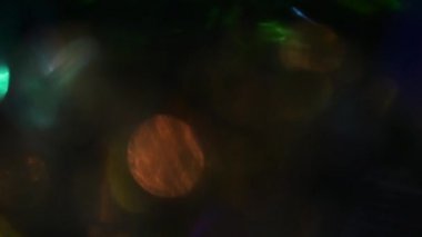 Çok renkli açık daireler, yansımalar. Işık yanardöner oyun.