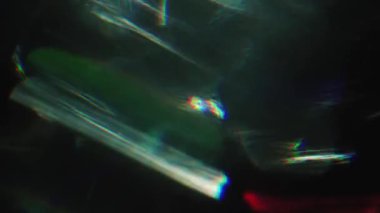 Işık, gökkuşağı paleti, holografik renklerin karışımı kaotik oyun.
