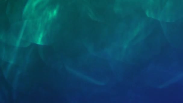 緑から青 色とりどりのボケのユニークなプレイ 抽象的な創造的な背景 フレア — ストック動画