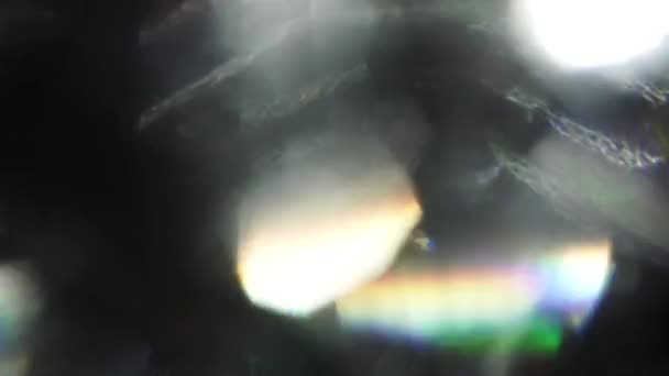 Mistura vintage de destaques do arco-íris em um fundo escuro . — Vídeo de Stock