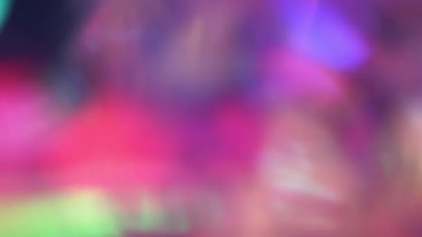 サイケデリックな虹色柄、鮮やかな虹の色、ホログラム箔. — ストック動画