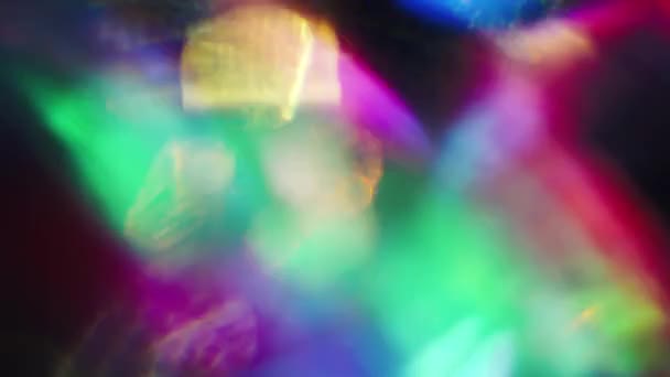 Суміш яскравих психоделічних кольорів, голографічної райдужної фольги . — стокове відео