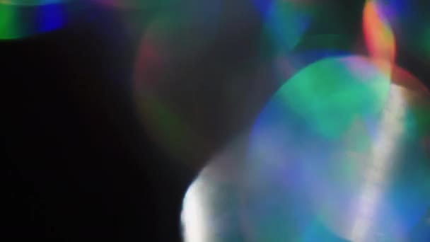 Futuristic background neon reflections multicolored particles in a dark studio. — Stock Video