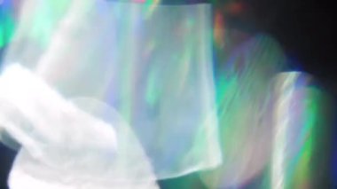 Holografik neon bokeh, yanardöner folyo, çok renkli parçacıklar.