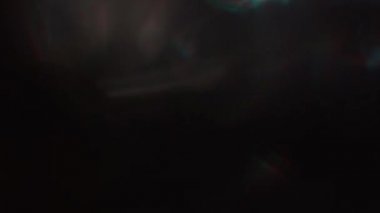 Hareket yaratıcı arka plan, renkli parçacıklar, eşsiz renklerin karışımı, parlak ve doymuş geçiş.