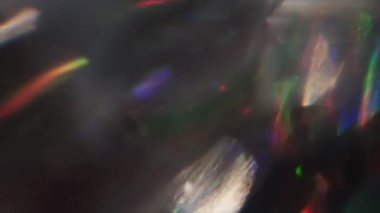 Yanardöner arka plan, parlak bokeh karanlıkta hareket.