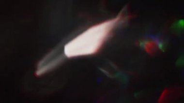 Holografik çok renkli arka plan, parçacıklar ışık, arıza, yanardöner folyo.