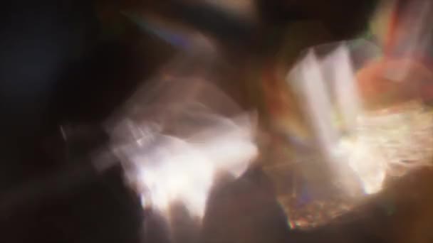 Motion fond créatif, bokeh brillant se déplaçant dans l'obscurité . — Video