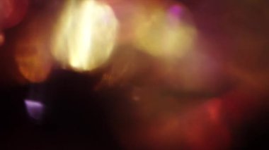 Yaratıcı hareket arka plan, Polikrom renkler bokeh. Glares, distorsiyonları, ışık sızıntıları.