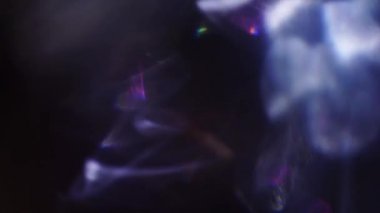 Holografik doğal arka plan, Motley Festival bokeh. Distorsiyonları, ışık sızıntıları, Glares, video geçişler.