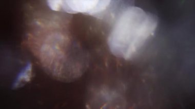 Şenlikli soyut arka plan, Motley şenlikli bokeh. Glares, ışık sızıntıları, deformeler, video geçişler.