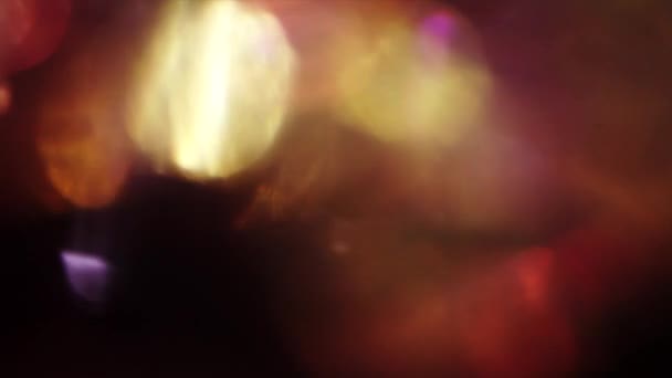 Creative motion background, polychrome colors bokeh. Glares, Distortions, Light leaks. — Stock Video