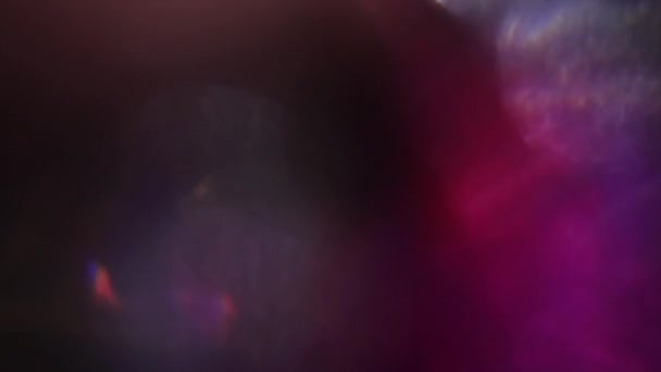 Fondo abstracto de movimiento, bokeh cromático colorido. Distorsiones, transiciones de vídeo, fugas de luz, destellos . — Vídeos de Stock