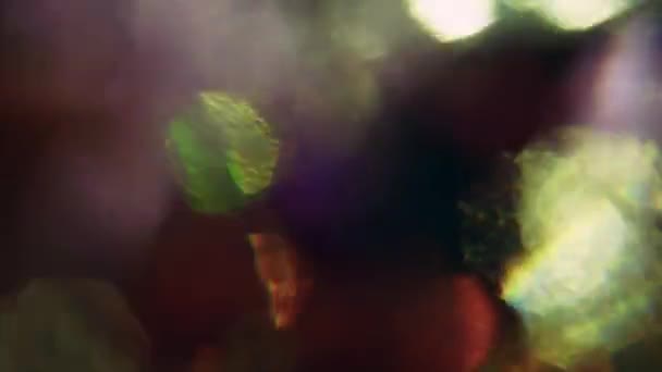 Psychodelic holographic light leaks flying in the dark. Natural created transition, creative overlay footage. — Stockvideo
