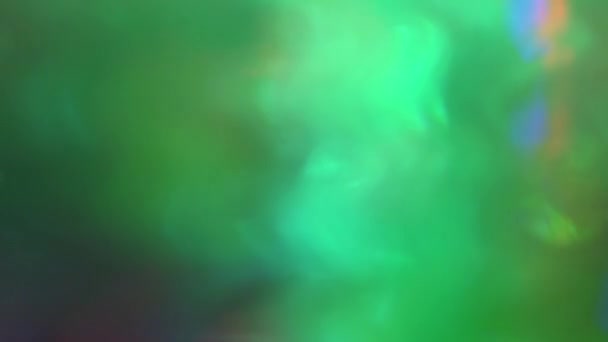 Des spots lumineux multicolores qui volent au hasard dans l’espace. 