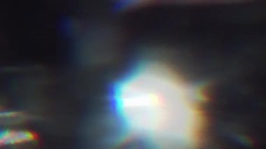 Benzersiz ışık parçacıkları, renkli dönüşümler, eski Tv efekti. Spor videoları bilim için ışık sızıntıları.