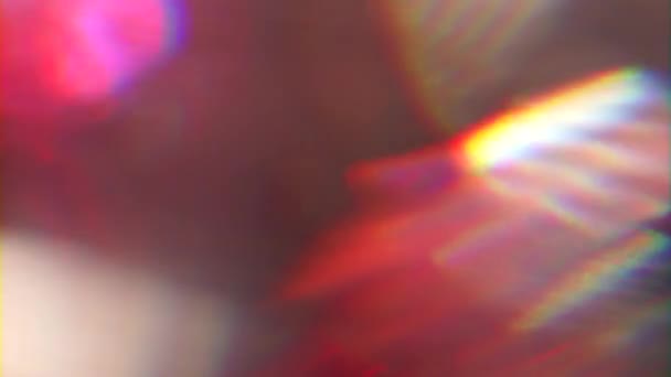Mångfärgad iriserande surrealistisk bakgrund, lysande bokeh, defokuserad glas reflektioner. — Stockvideo