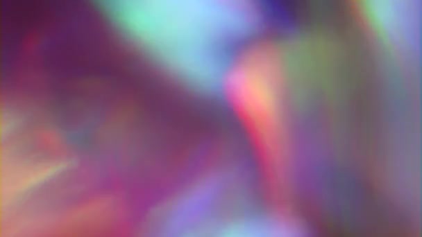 Veelkleurige iriserende natuurlijke achtergrond, gloeiende licht, veelkleurige reflecties. — Stockvideo