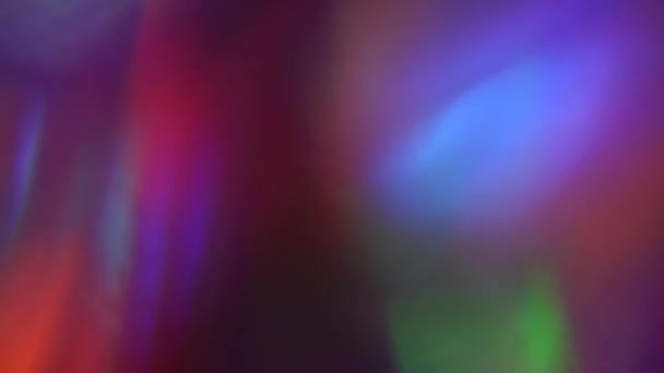 サイケデリック虹色の創造的な背景、トランジション、デフォーカスガラス反射. — ストック動画