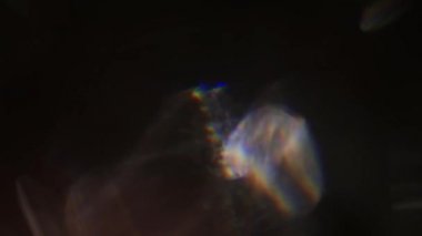 Cyberpunk renkli bokeh siyah arka plan üzerinde parlayan. Yaratıcı soyut bindirmeler.