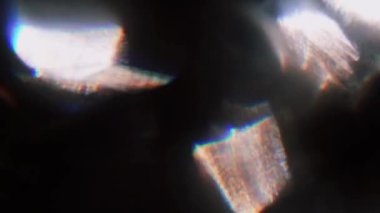 Vintage renkli bokeh koyu arka plan üzerinde parlayan. Hareket soyut parlama.