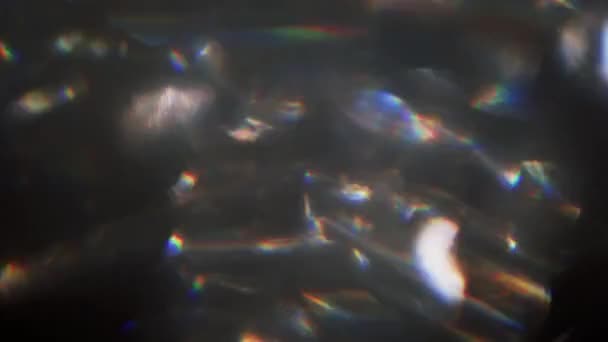 Bokeh coloré surréaliste scintillement sur fond sombre .