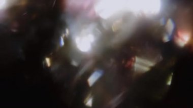 Psychedelic canlı bokeh siyah arka plan üzerinde titreşen. 