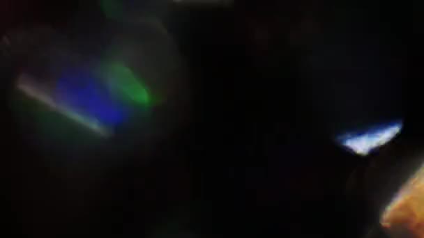 Pszichedelikus 60s színes bokeh impulzusok és világít a sötétben. — Stock videók