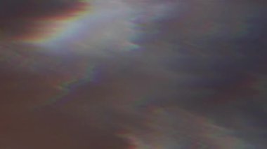 Siyah arka plan üzerinde defocused psychedelic holografik ışık parıltıları. 