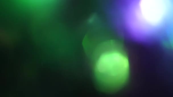 Multi-colored bokeh futuristic dreamy iridescent background. — Stock Video