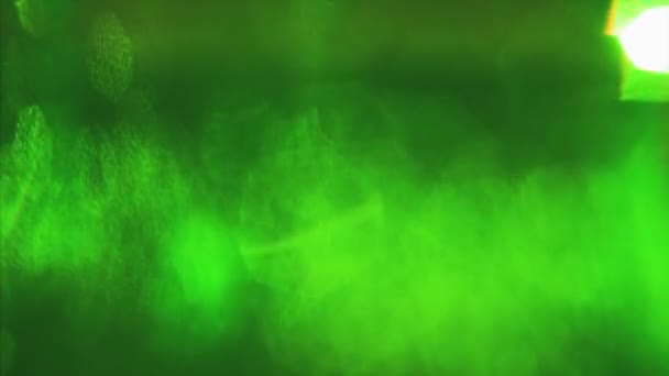 Casual green colored sci-fi psychedelic glittering background. Light leaks. — Stock Video