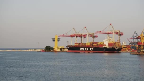 ODESSA, UKRAINE - AUG 24, 2019: Panorama of a marine port crane of Odessa sea commercial port in Ukraine . — Stok Video